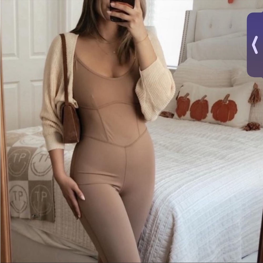 Joylab flare leg jumpsuit size small.